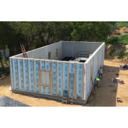 Tank set inside prefab building