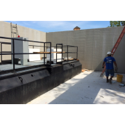 Tank set inside prefab building